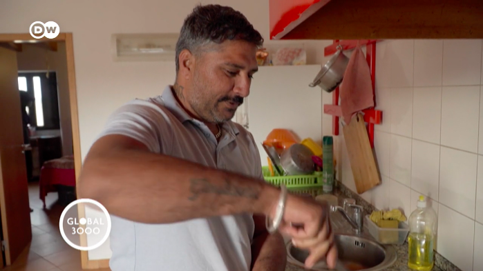 A harvest worker from South Asia shares a house with others in southern Portugal | Screengrab from DW Global 3000 video