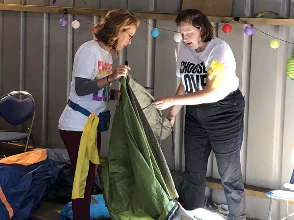 Sol Escobar and a fellow volunteer salvaging discarded tents in September 2019 in Cambridge for use in Calais | Photo: Courtesy of Sol Escobar