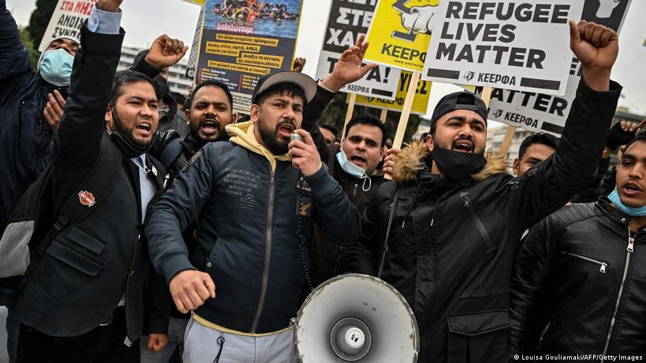 Migrants protesting near the Greek parliament against alleged pushbacks and border violence. Greece has repeatedly and strongly denied that its forces are involved in pushbacks | Photo: Louisa Gouliamaki/AFP/Getty Images