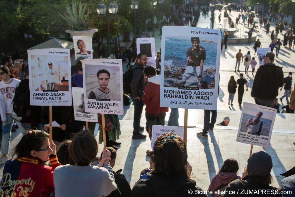 Protesters with placards showing pictures and the names of migrants who allegedly died due to pushbacks in Athens, Greece, on April 20, 2022 | Photo: picture alliance/ZUMAPRESS.com