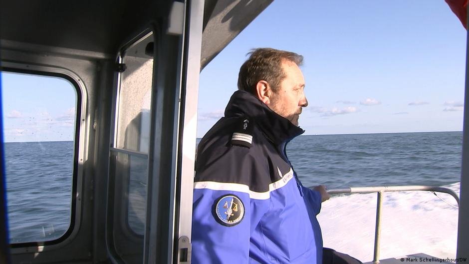 Ludovic Caulier patrols the coast by boat