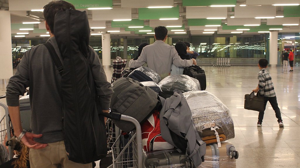 Afghan refugees leave from Islamabad, Pakistan, for their resettlement in Germany on November 03, 2025 | Photo: Nabila Lalee/dpa/picture-alliance
