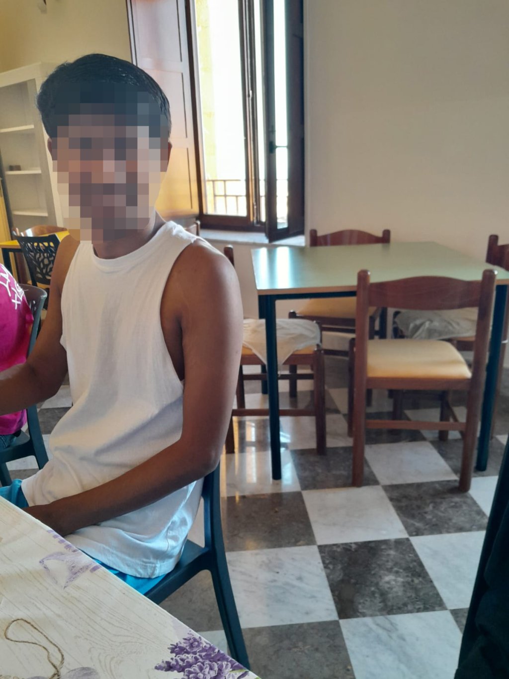 Rahim is still just 17 so we have pixeled his face to protect his identity | Photo: Alessandro Puglia / InfoMigrants