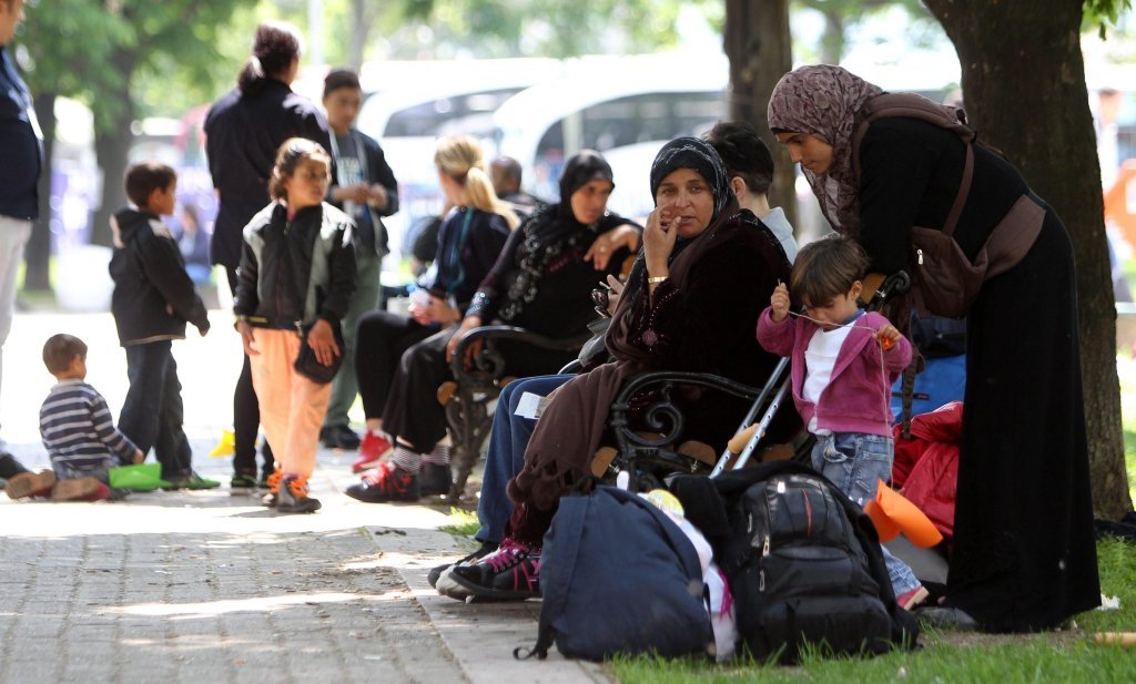 Des migrants sur la route des Balkans font une pause à Belgrade | Photo : EPA/KOCA SULEJMANOVIC