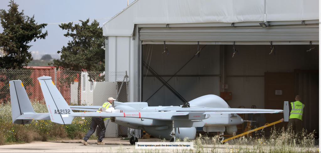 One of the drones used by Frontex is pushed into its hangar in Malta by operators | Photo: HRW / Border Forensics Aerial Surveillance Report