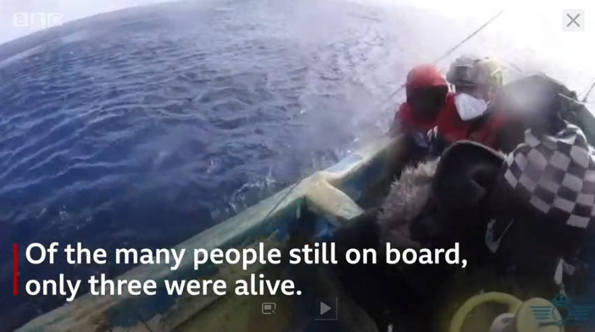 Aicha is pictured wearing red on the left here during the rescue mission. Screenshot from BBC Video, footage from the Spanish Military | Source: BBC Video