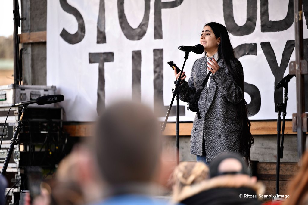 Syrian refugee Aveen Issa – one of dozens of Syrian refugees eligible for deportation in Denmark – speaking at a protest in Copenhagen on April 21, 2021 | Photo: Ritzau Scanpix/Imago