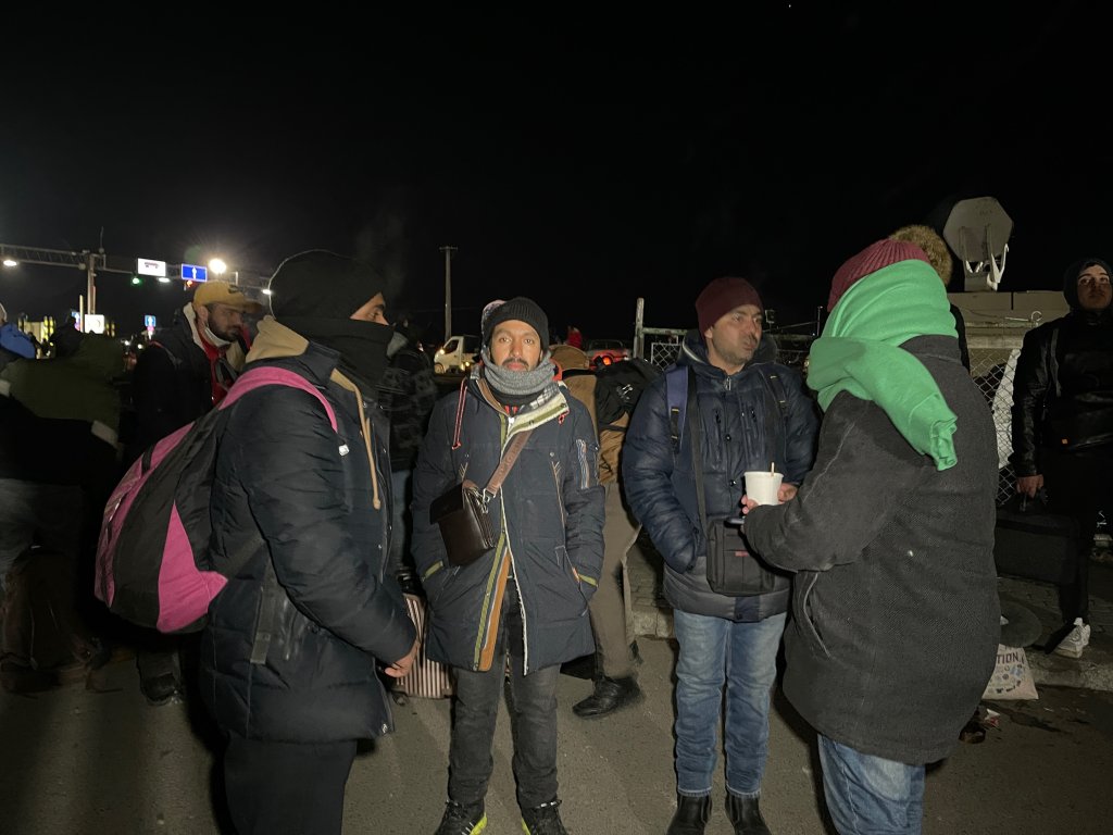 Bangladeshi migrants wait at the Ukraine-Poland border, February 28, 2022 | Photo: Arafatul Islam