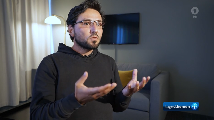 Salwan Momika talks to ARD. The reporter said before the interview, the man seemed to happy to spread misinformation and far-right theories | Source: German state TV ARD